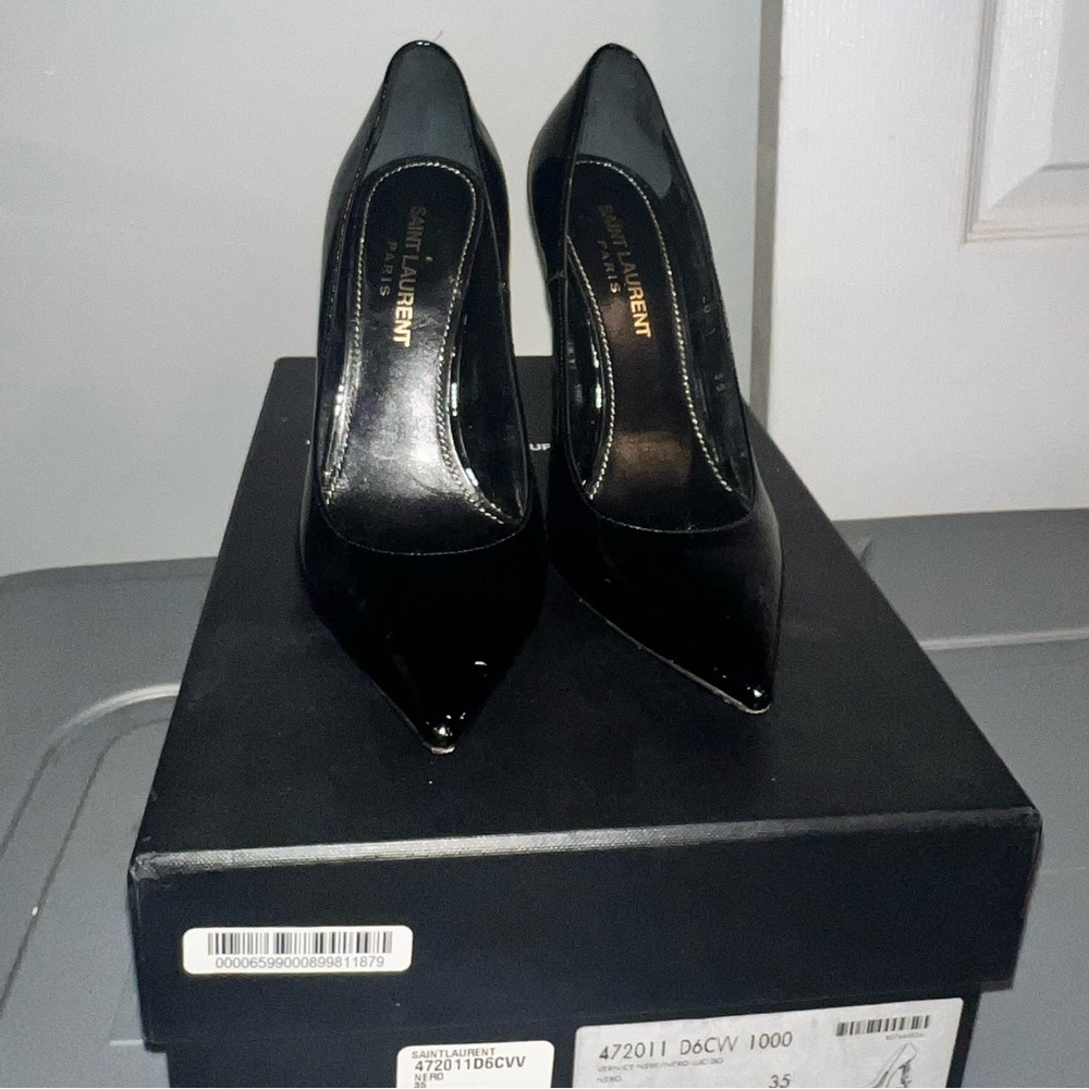 Black Patent YSL Opyum Pumps.